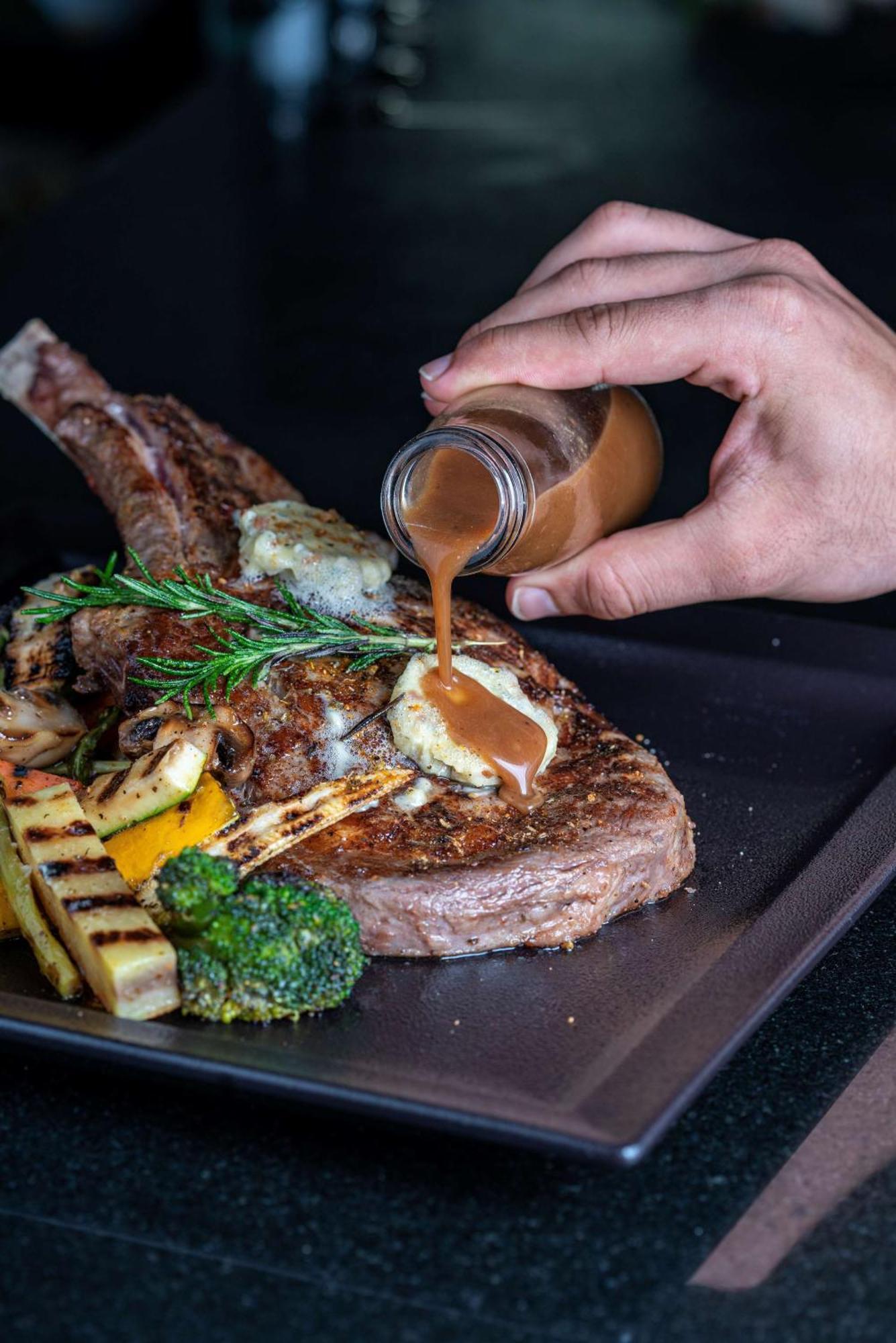 Radisson Blu Hotel & Resort, Сухар Экстерьер фото A steak being drizzled with a sauce